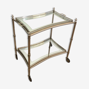 Neoclassical style rolling table in silver metal