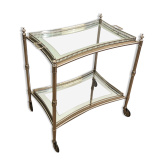 Neoclassical style rolling table in silver metal