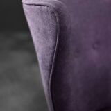High-backed wing chair in oak and purple fabric, vintage Scandinavian style from the 1950s.