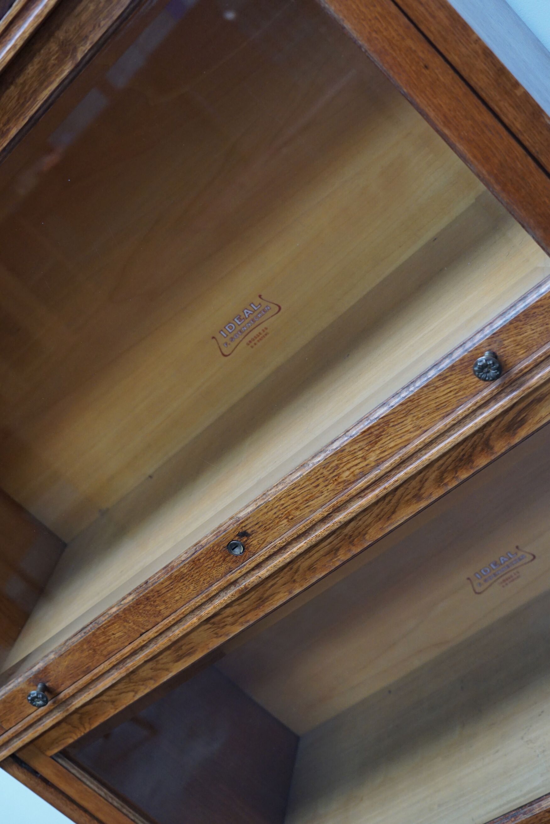 German oak bookcase with folding doors, ca 1900