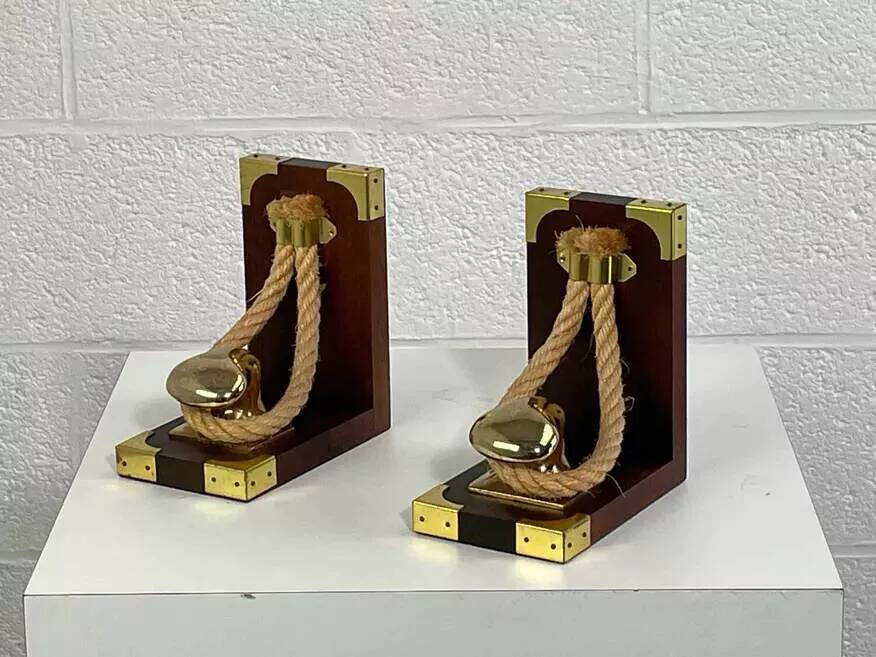Pair of antique wooden and brass bookends