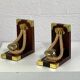 Pair of antique wooden and brass bookends
