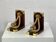 Pair of antique wooden and brass bookends