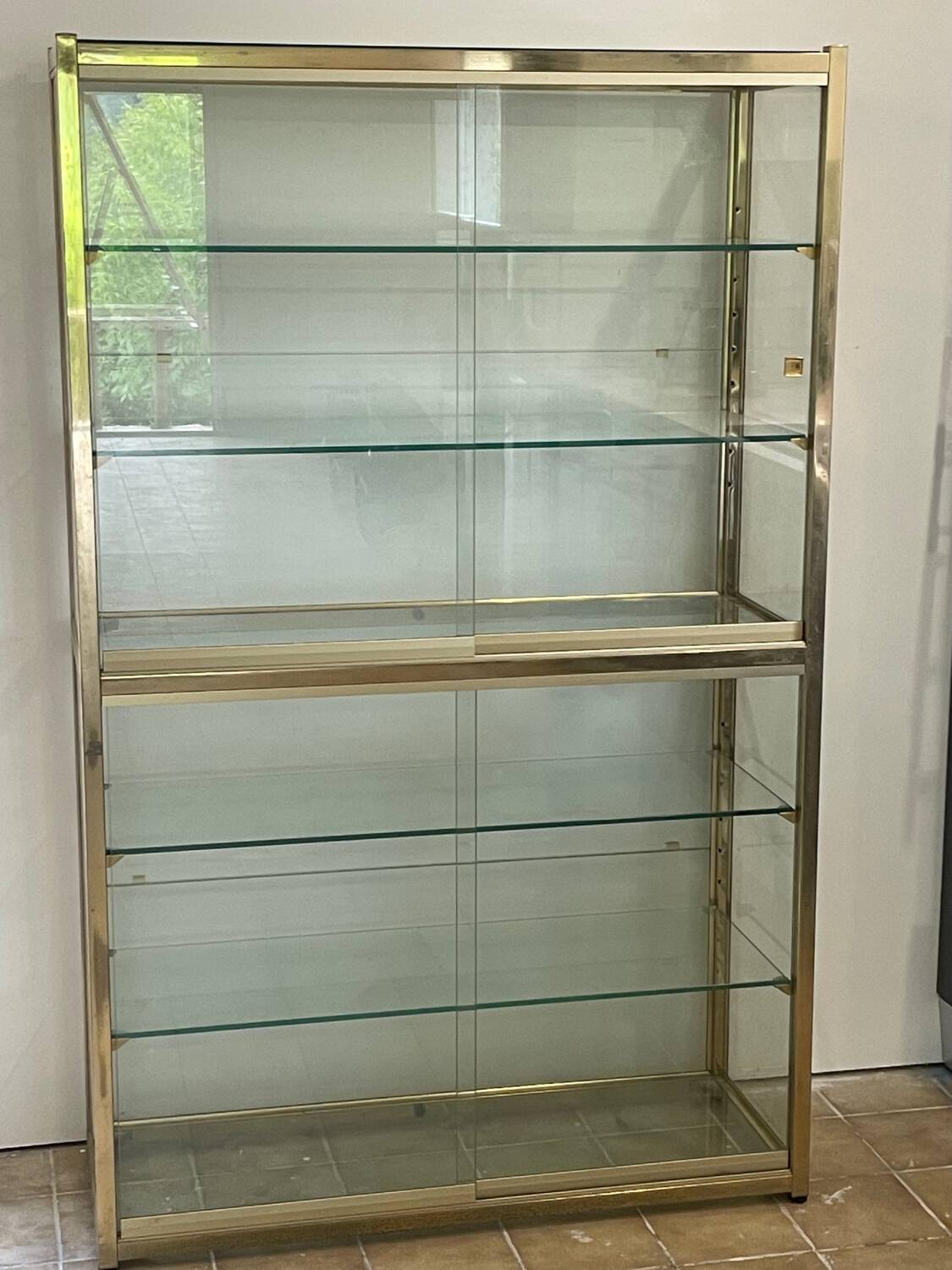 Large exhibition window in gilded brass 20th century period