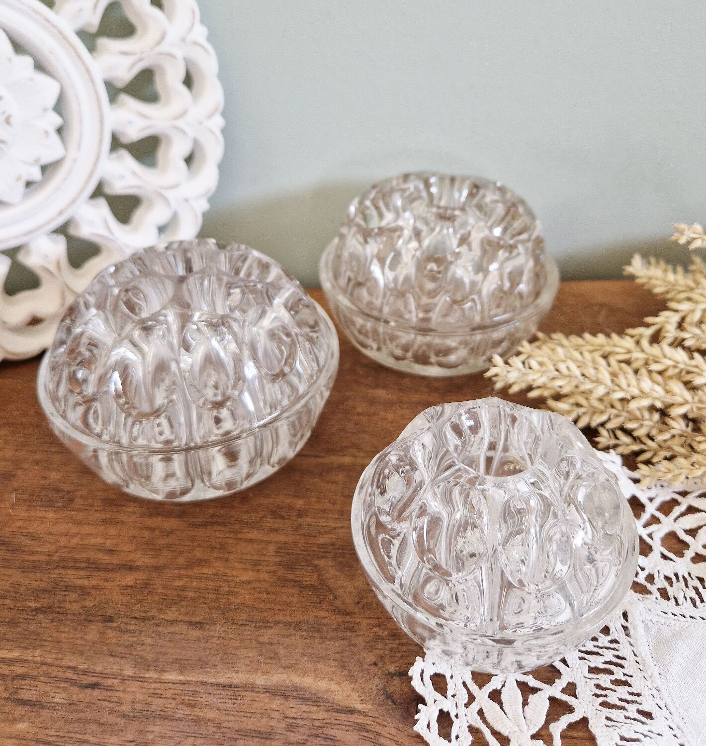 Set of three vintage flowers in transparent molded glass