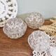 Set of three vintage flowers in transparent molded glass