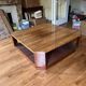 Varnished coffee table in exotic wood