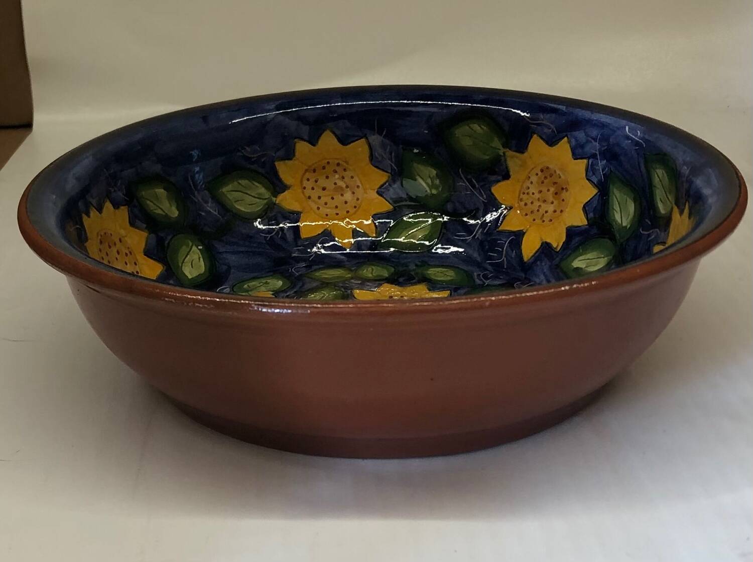 Portuguese ceramic dish decorated with sunflowers
