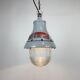 Grey industrial explosion proof light from Crouse-Hinds, 1970s