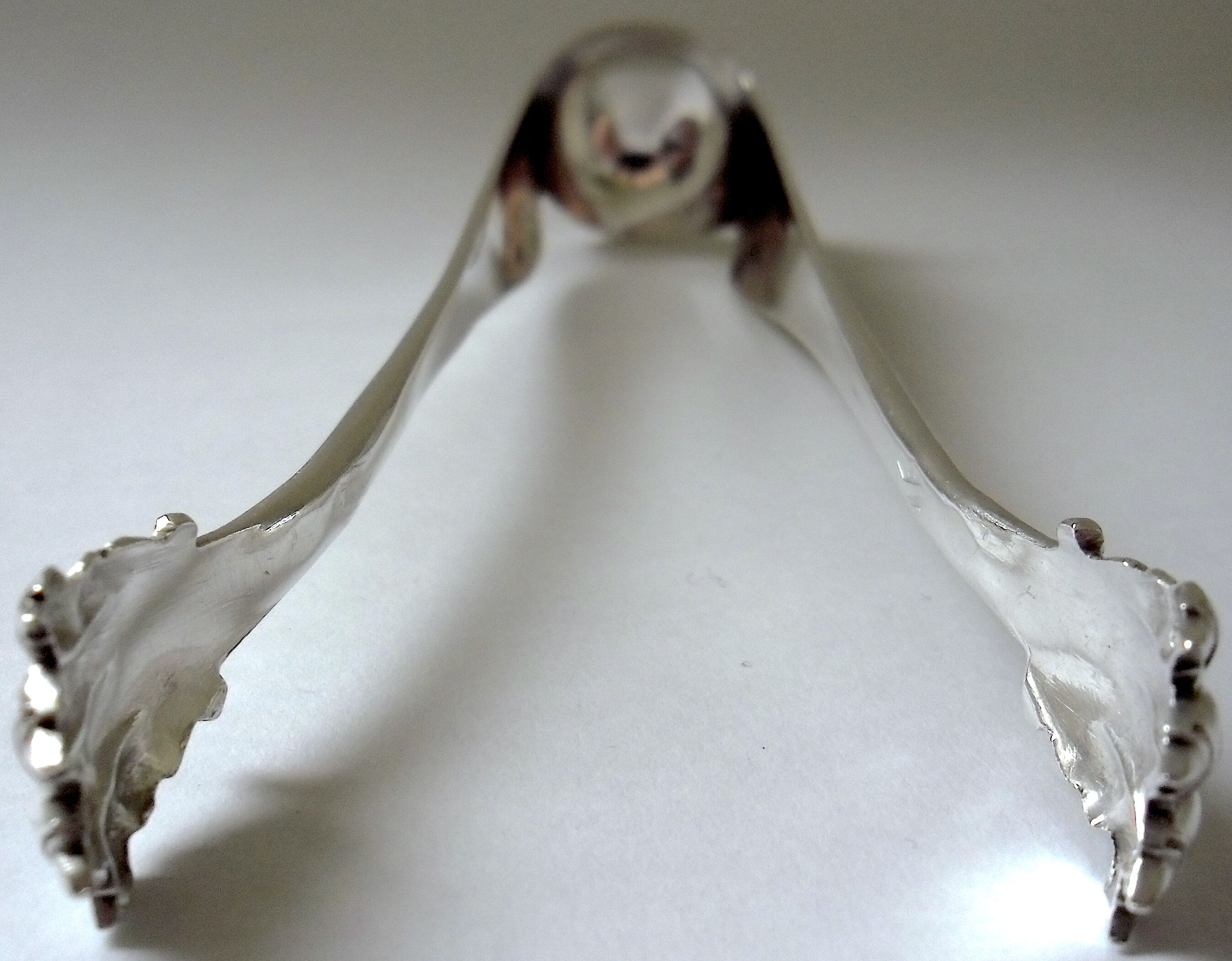 Silver sugar pinch, Minerva punch