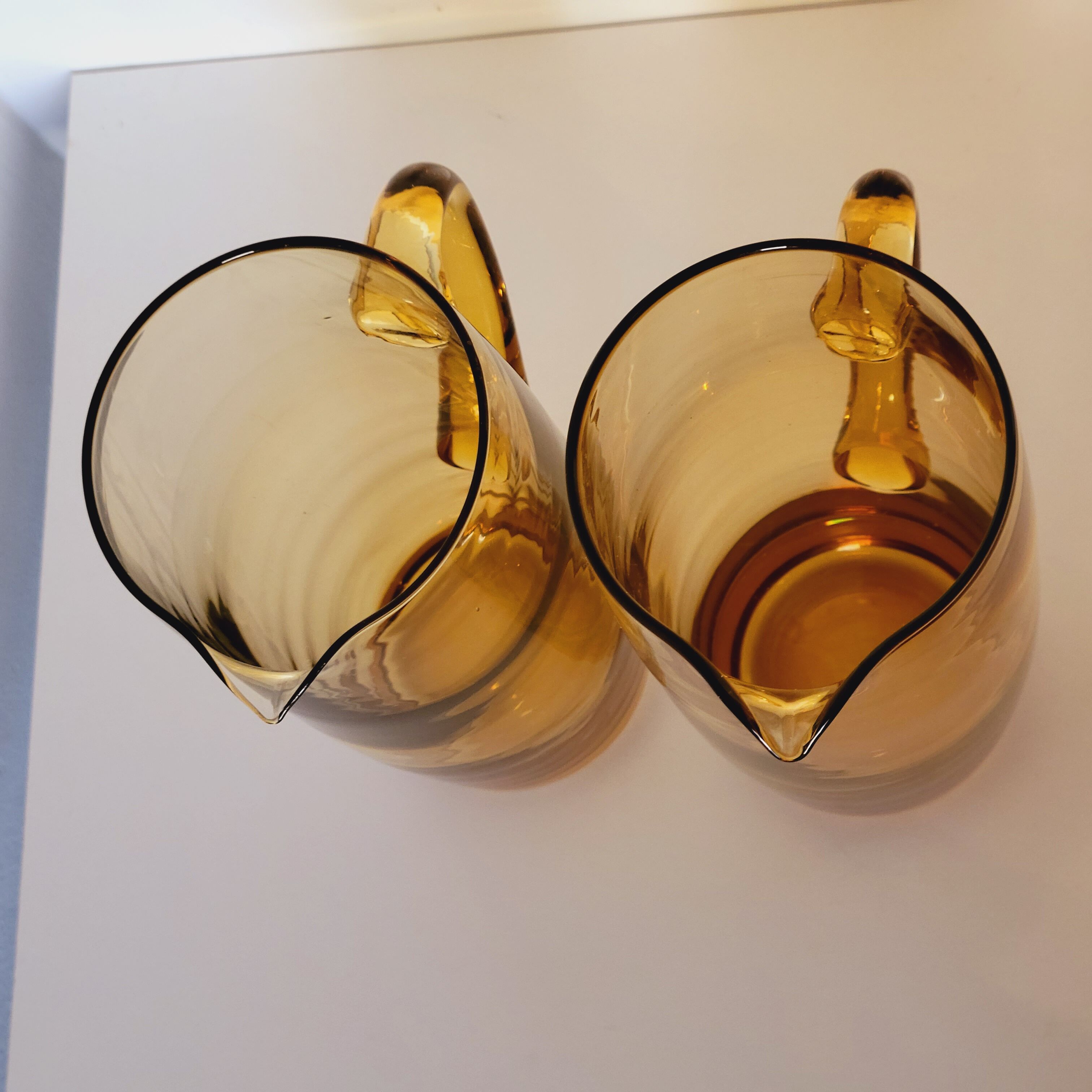 2 carafes in vintage amber yellow blown glass