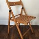 2 folding wooden chairs