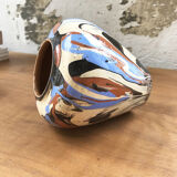Vase dripping in varnished earth