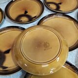 Set of ten Moulin des Loups fish plates.