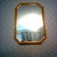 Miroir octogonal en bois clair biseauté