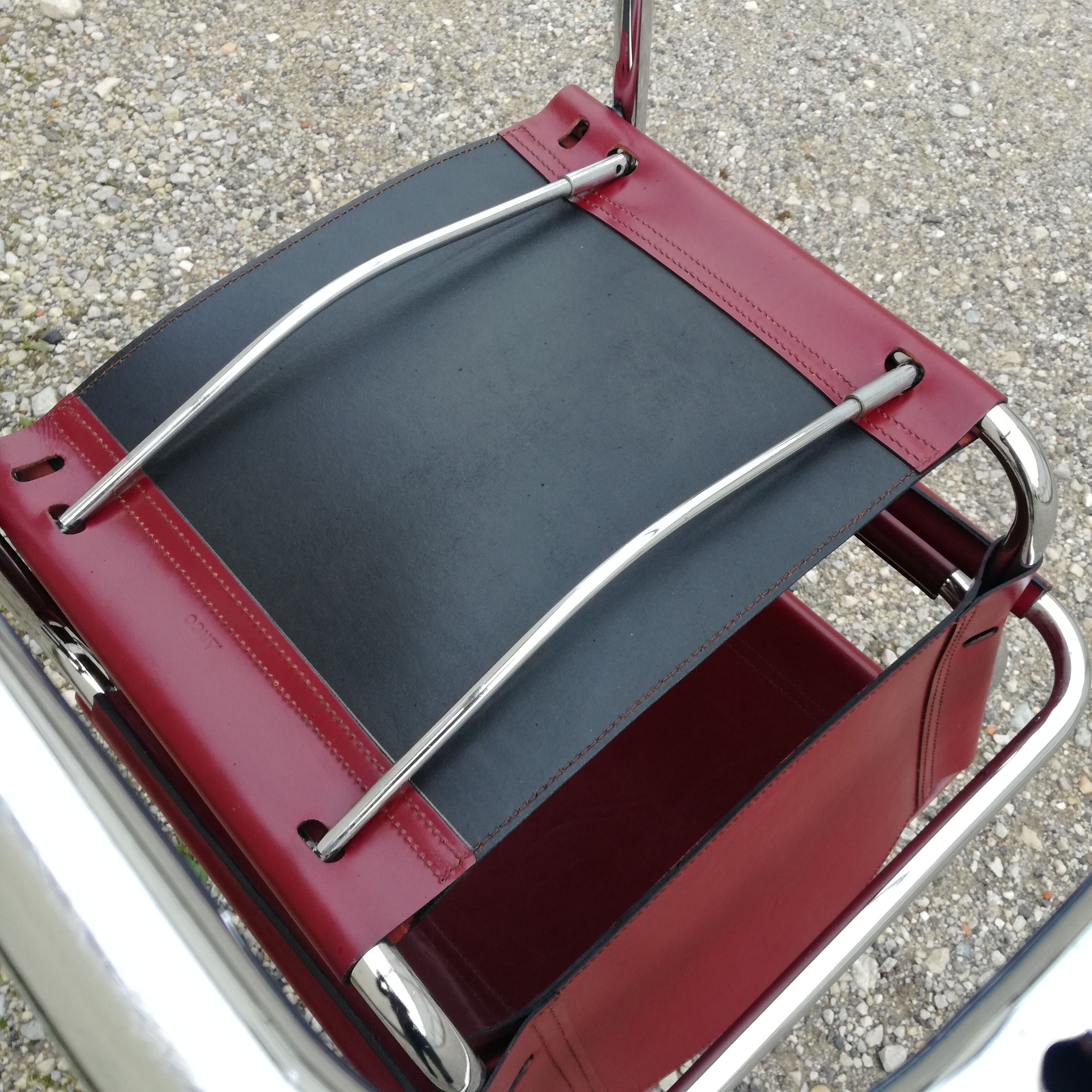 Cantilever armchair in burgundy leather and chrome