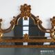 Miroir rococo-vénitien belge du XXe siècle en bois doré