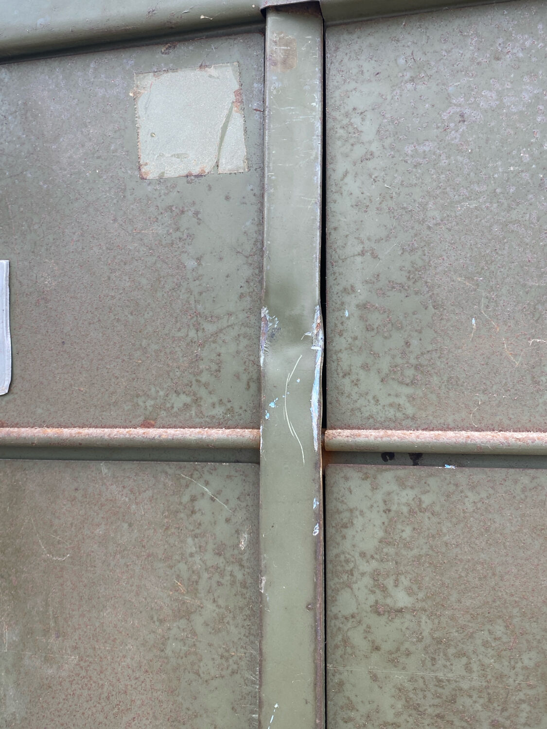 Military metal cabinet with hinged door