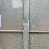 Military metal cabinet with hinged door