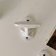 Antique Art Deco wall coat hook in enamelled cast iron.