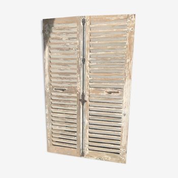 Pair of patinated wooden shutters