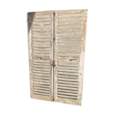 Pair of patinated wooden shutters