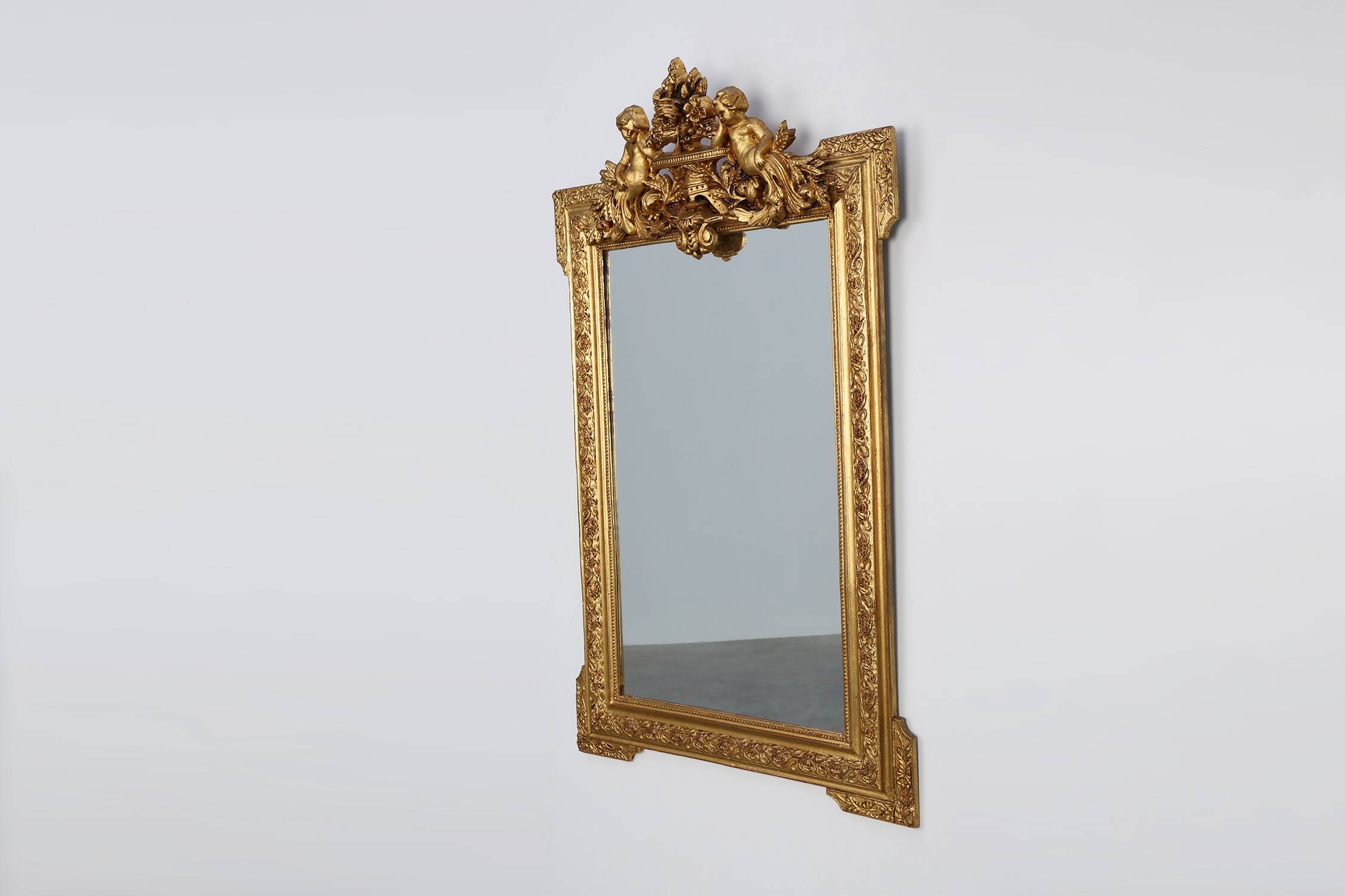 French rococo style richly sculpted gilted oak mirror, 19th century