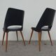 2 chairs in black skai compass legs Louis Paolozzi
