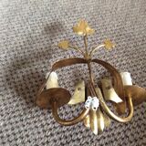 Wall lamp in gold metal