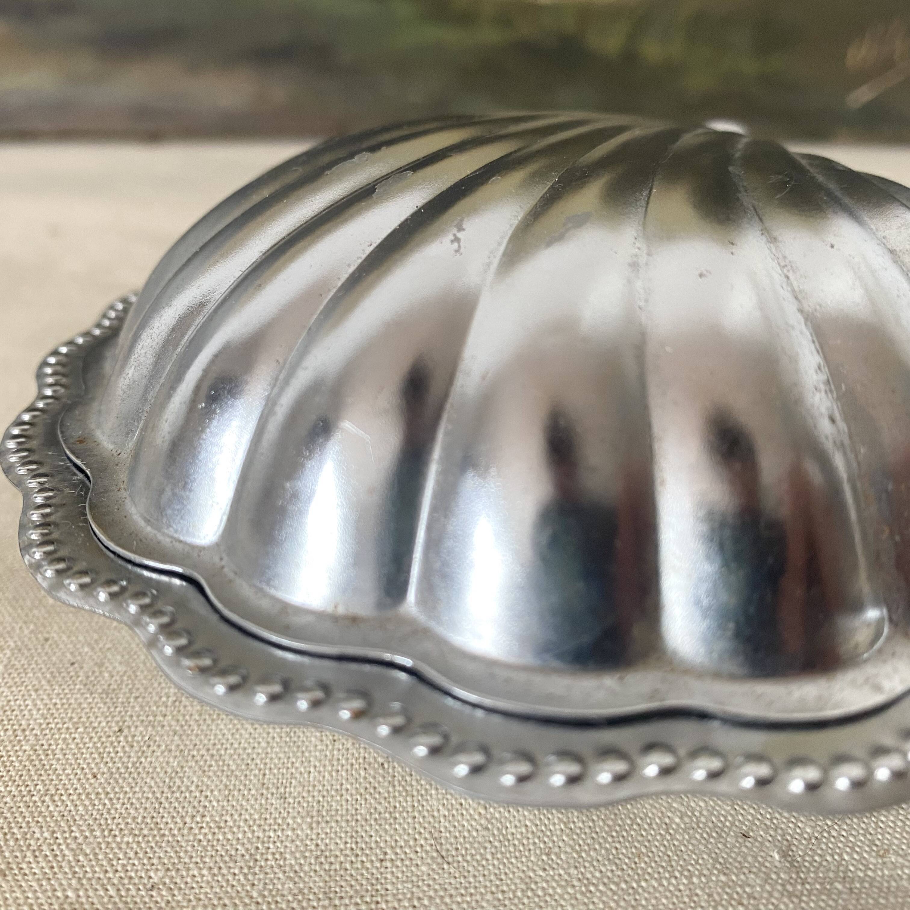 Stainless steel and glass shell butter dish with knife