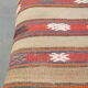 Oriental pouf upholstered in an antique kilim