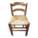 Old rustic wooden armchair – seat in woven rush