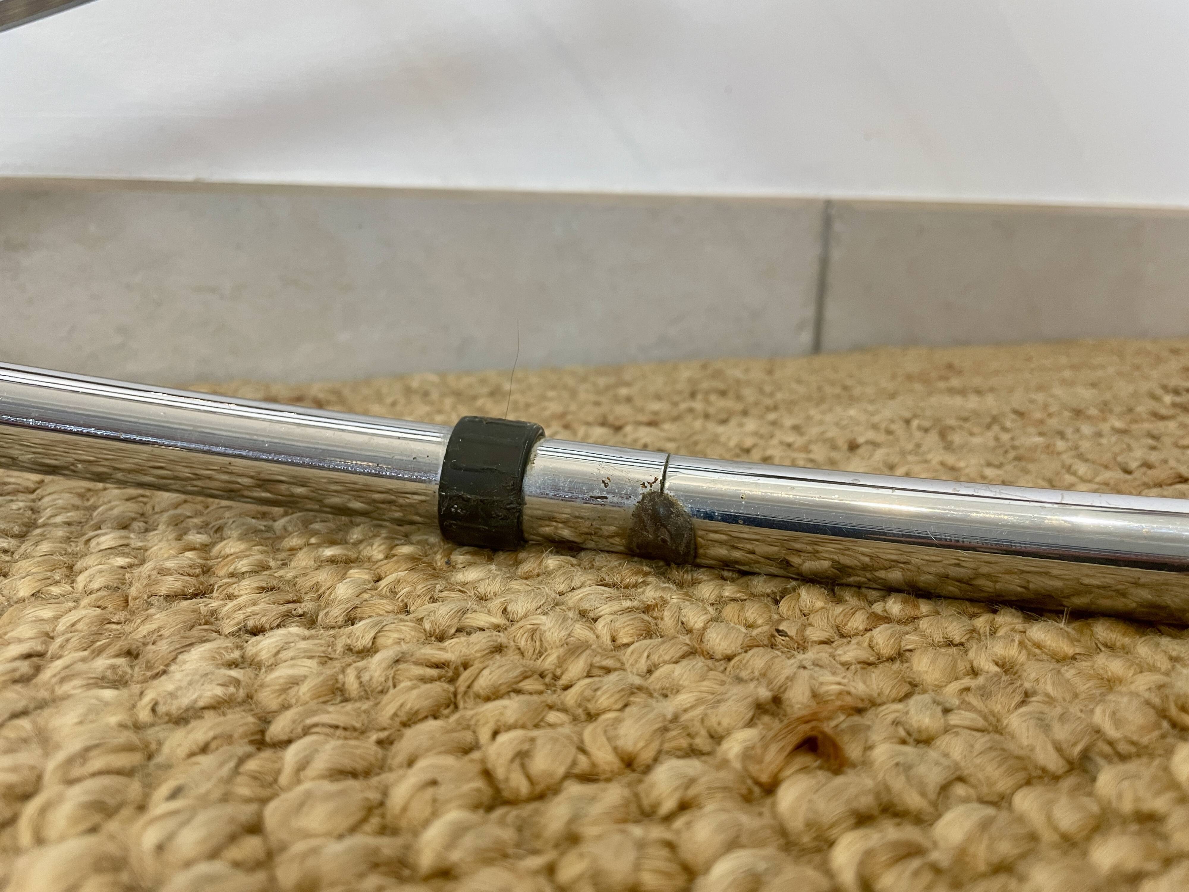 Coffee table with glass top and chrome tubular base