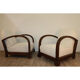 Pair of modernist armchairs in wood and buckle fabric, 1940