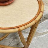 Round coffee table in vintage rattan