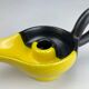 Mid-century yellow and black ceramic cellar rat candle holder
