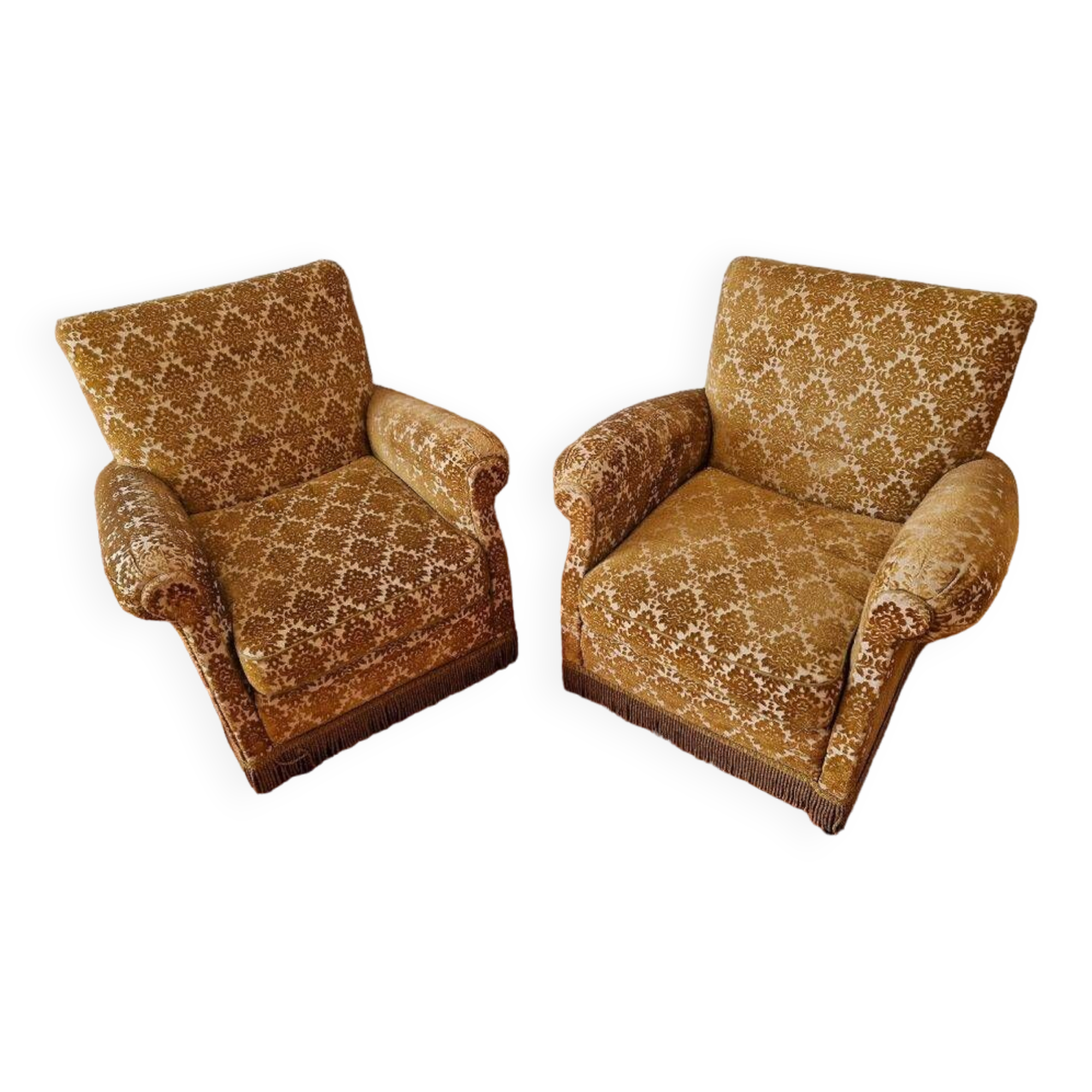 Pair of golden fringed armchairs