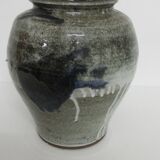 Ovoid vase in varnished sandstone