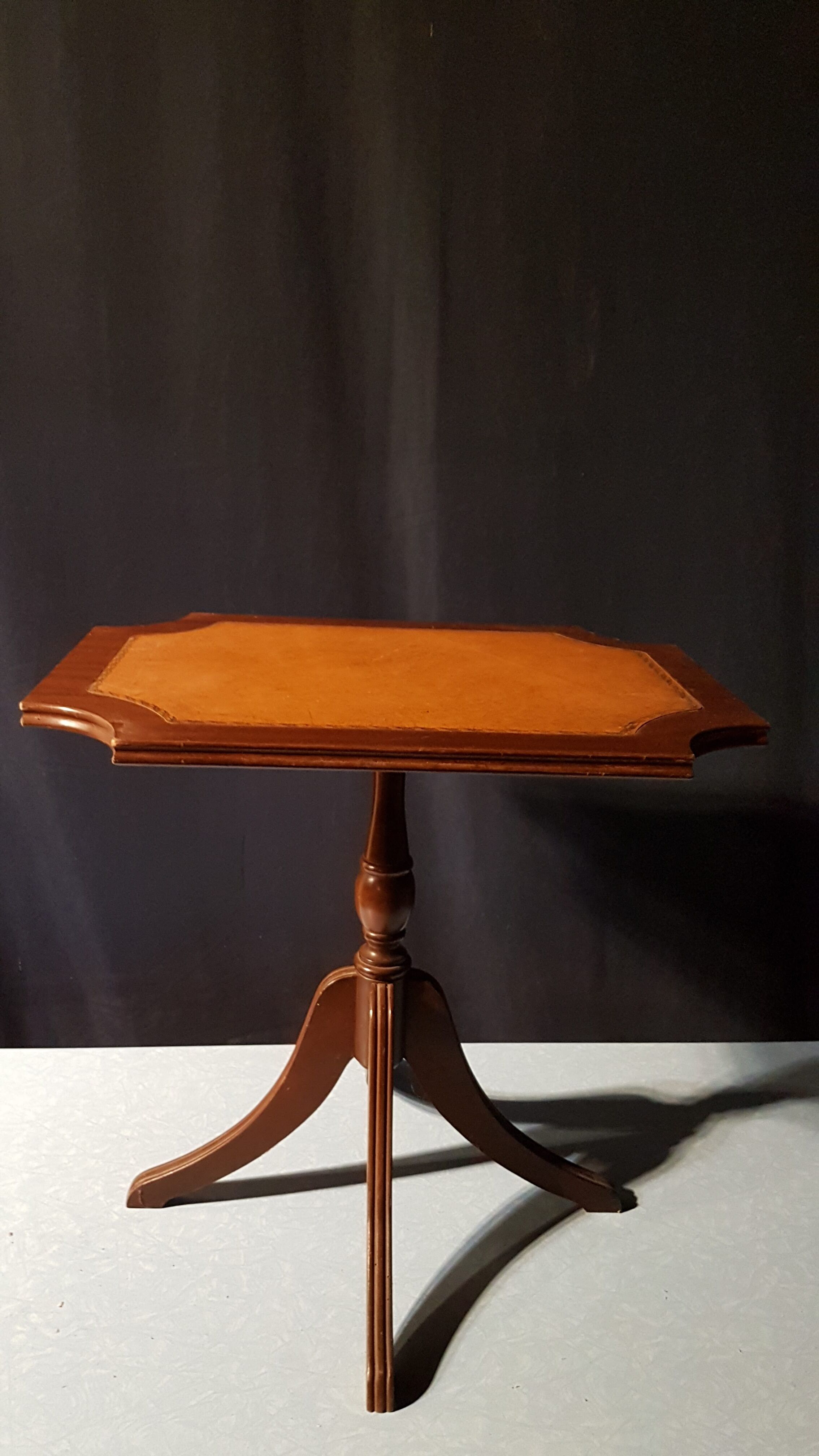 Small wooden and leather side table