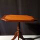 Small wooden and leather side table