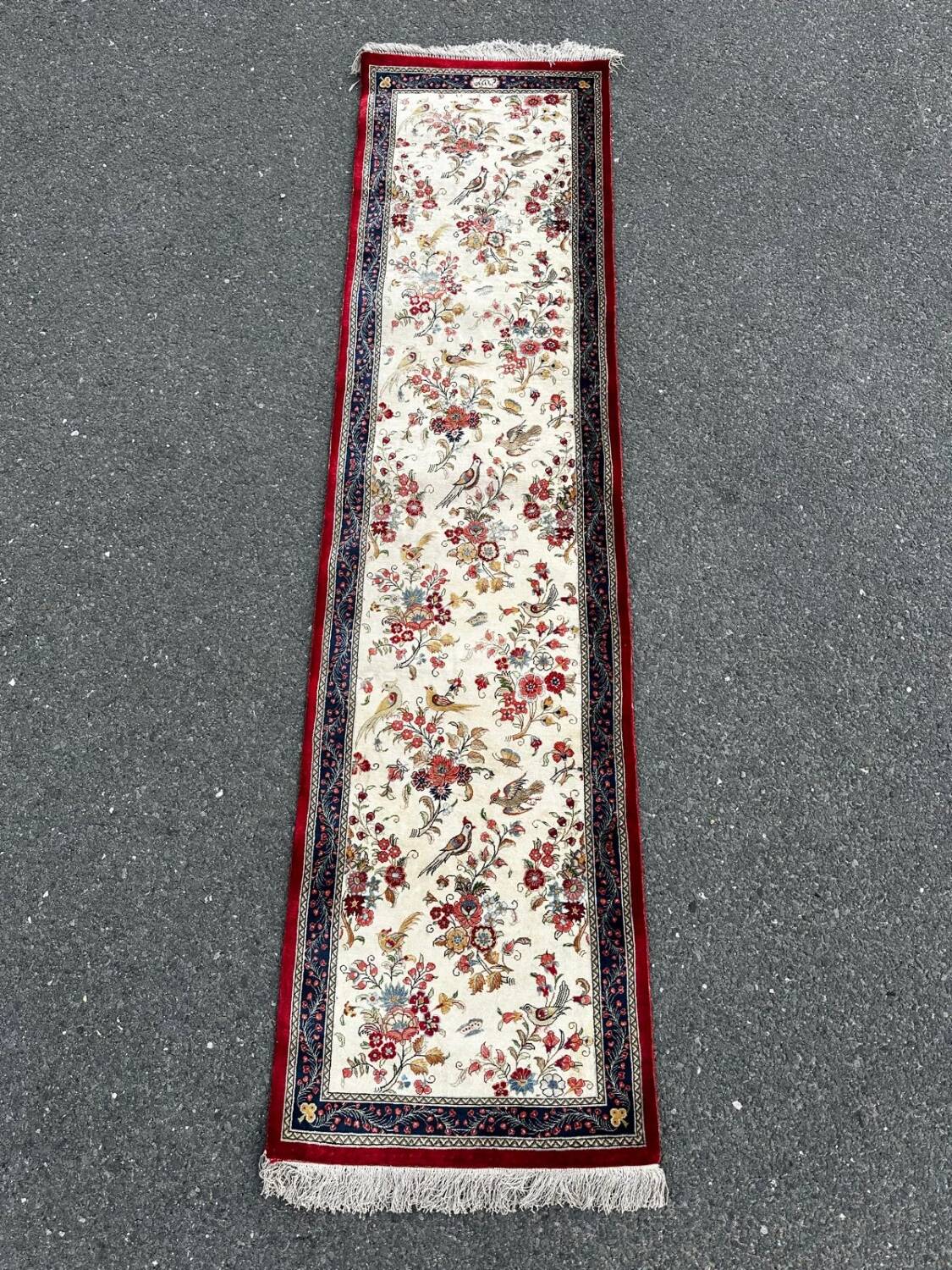 Tapis Hereke signé en soie