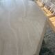 Table octogonale en travertin 130 cm Artelano état neuf