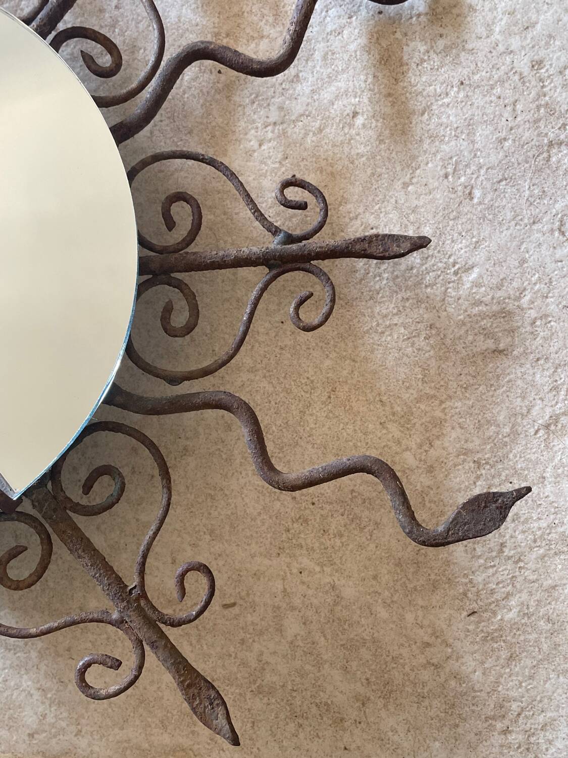 Luminous wrought iron sun mirror