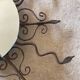 Luminous wrought iron sun mirror