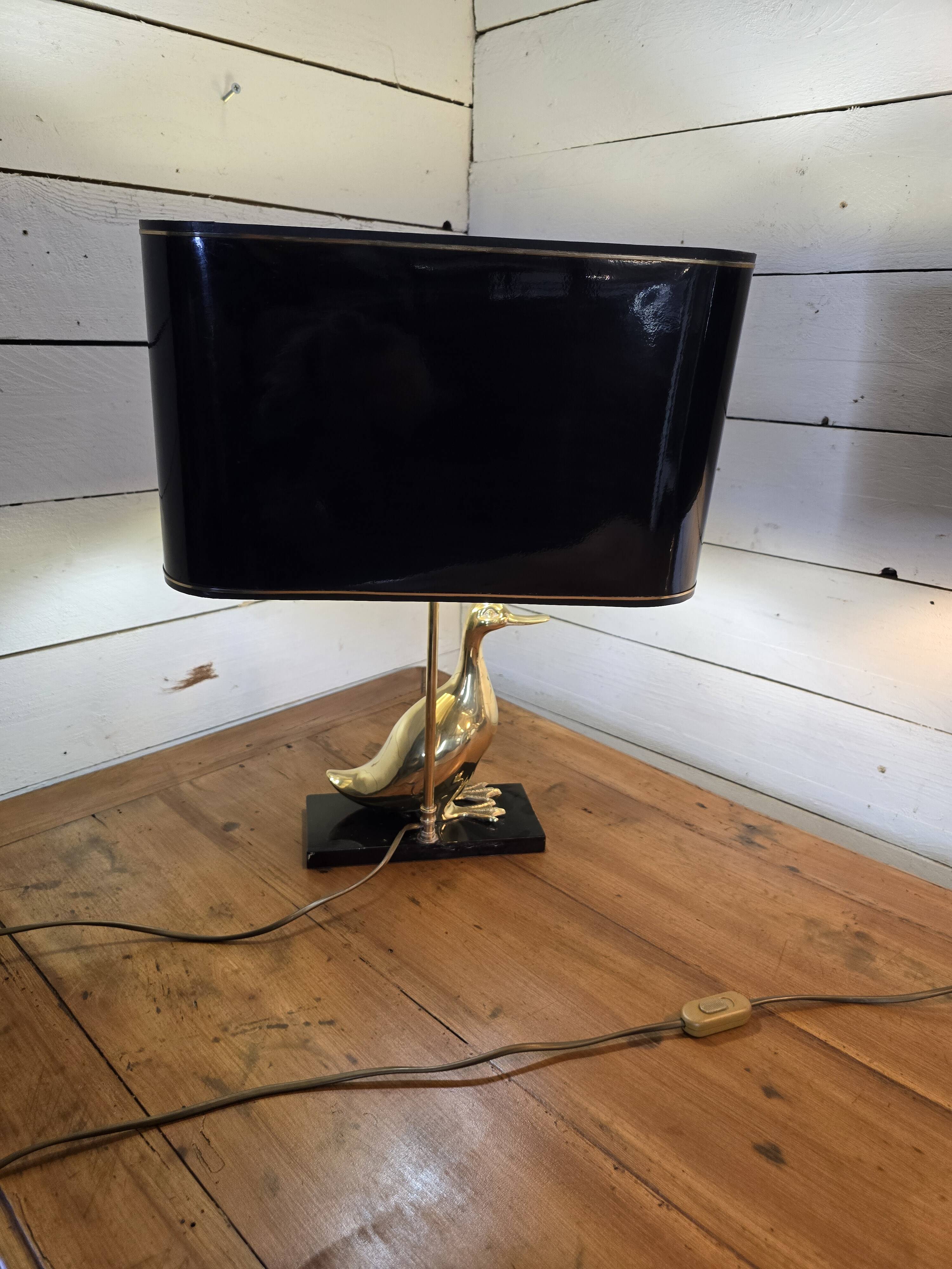 Pair of 70s table lamps featuring a brass duck