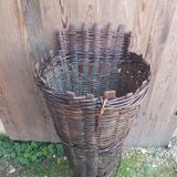 Old grape pickers basket woven wicker vintage wine vines decoration