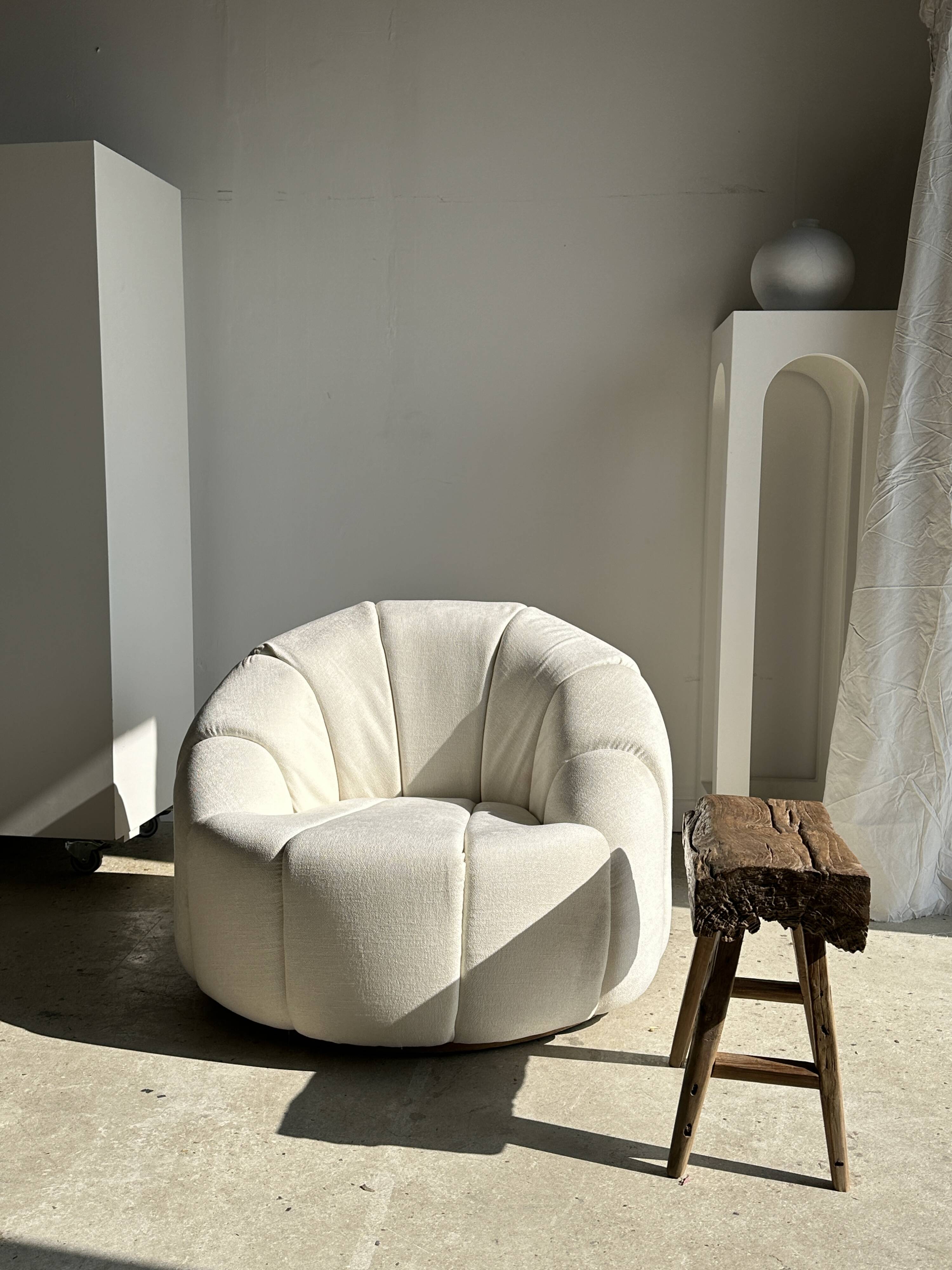 Large white circular armchair, white fabric upholstery