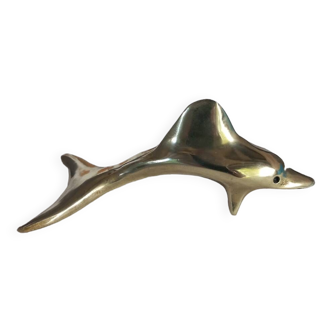 Dolphin brass design