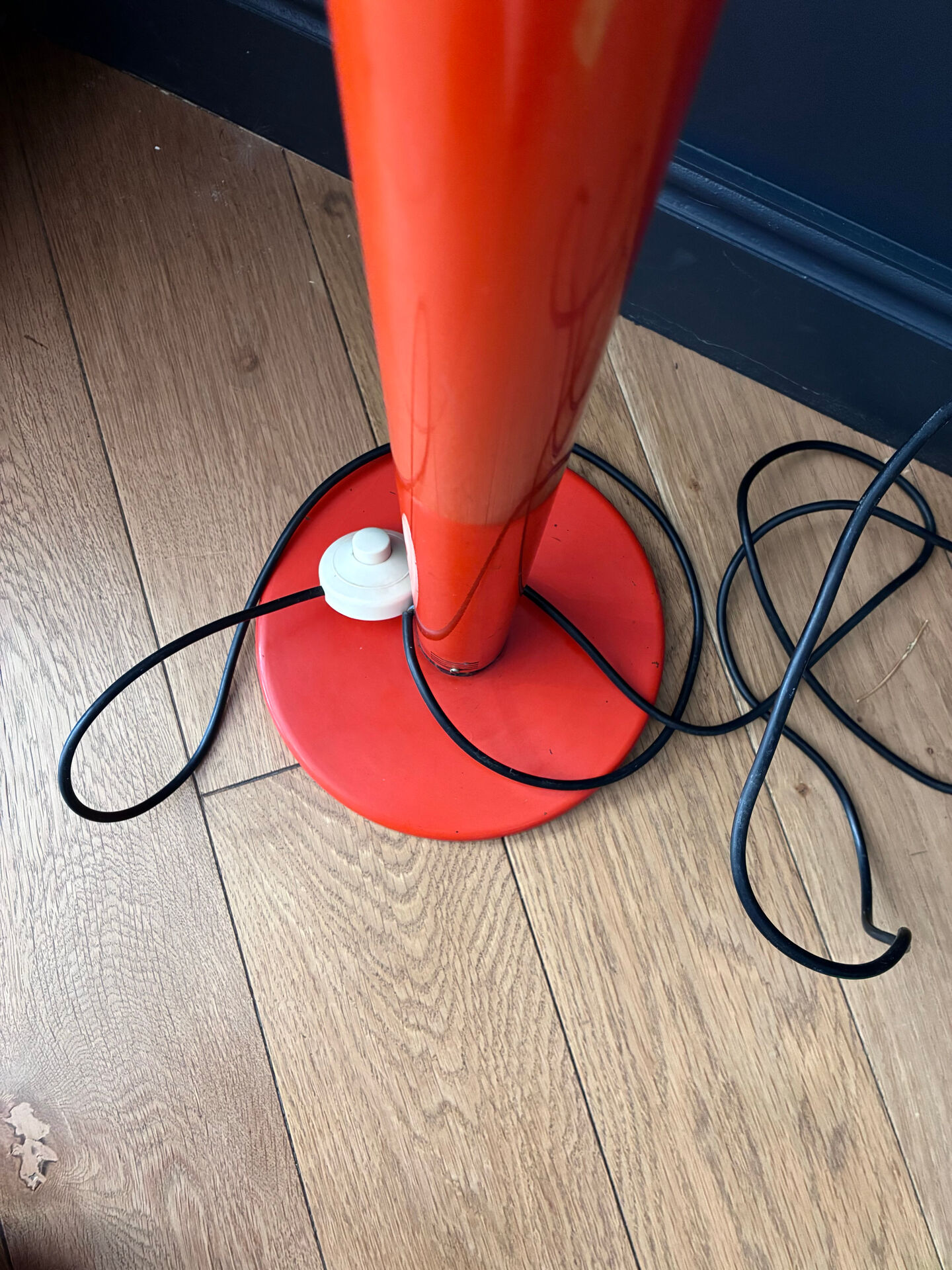 1970s orange lacquered metal floor lamp.