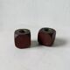 Pair of 1960s teak and brass "dice" candlesticks